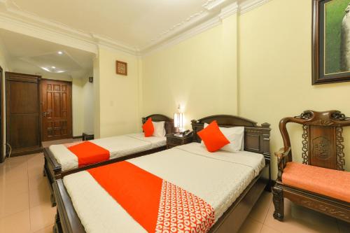 Postel nebo postele na pokoji v ubytování Lucky 2 Hotel & Travel