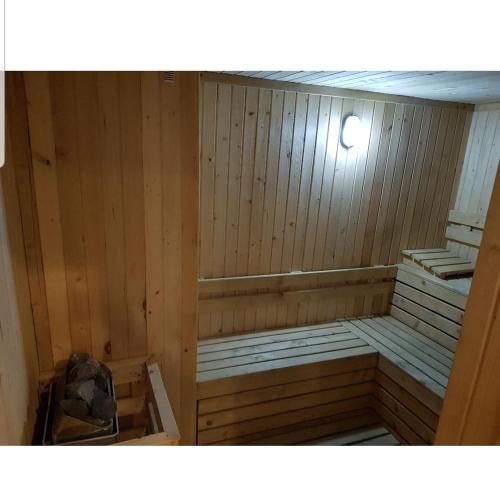 a wooden sauna with a light on top of it at 2 Bed Room Amazing Sea View Condo 80sqm Fast Internet in Jakarta