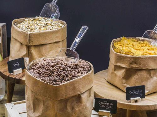 three bags of food on display on a table at Ibis Madrid Getafe in Getafe