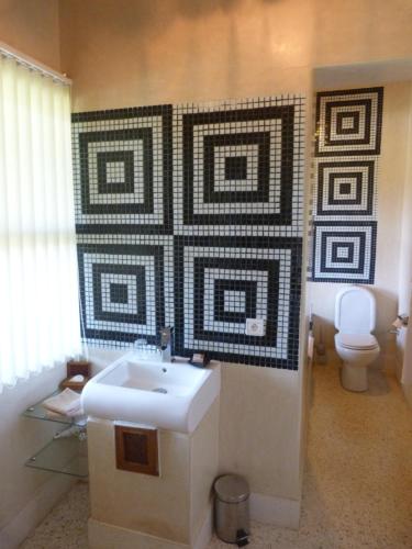 a bathroom with a sink and a toilet at Domaine Malika - Adults Only in Ouirgane