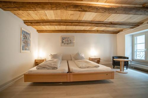 En eller flere senge i et værelse på Hotel Mokka Laufenburg