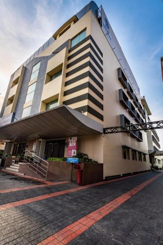 a large building with a building at Best Western Ramachandra in Visakhapatnam