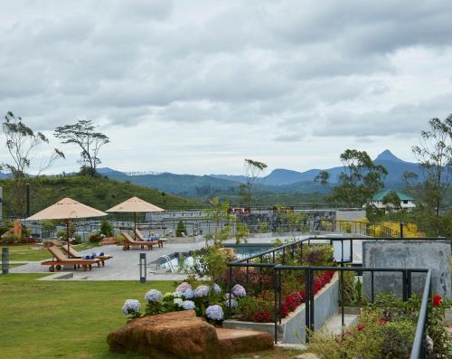 a view of a resort with mountains in the background at The Argyle Luxury Boutique in Hatton