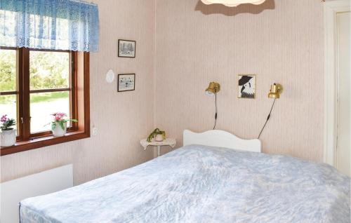 Ένα ή περισσότερα κρεβάτια σε δωμάτιο στο Holiday Home Entsebo Järnforsen