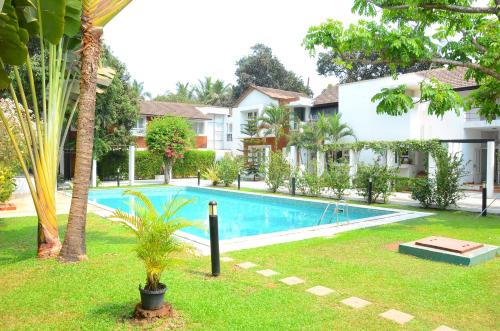 an image of a swimming pool at a resort at Villa Samaara1 on Candolim Main Road pool facing in Candolim
