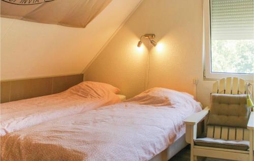 Postel nebo postele na pokoji v ubytování Bij Het Bos