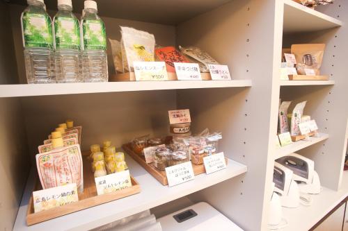 a shelf filled with lots of different types of food at Hotel Kuretakeso Hiroshima Otemachi in Hiroshima