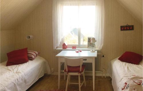 Una cama o camas en una habitación de Awesome Home In Sölvesborg With Wifi