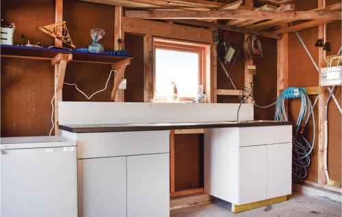 Virtuvė arba virtuvėlė apgyvendinimo įstaigoje 4 Bedroom Gorgeous Home In Hervik