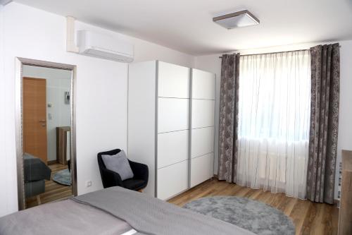 Postel nebo postele na pokoji v ubytování Weingut Apartment Hildegard Gangl