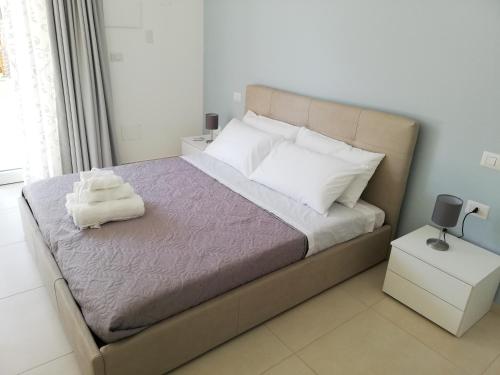 Postel nebo postele na pokoji v ubytování Assteas Rooms