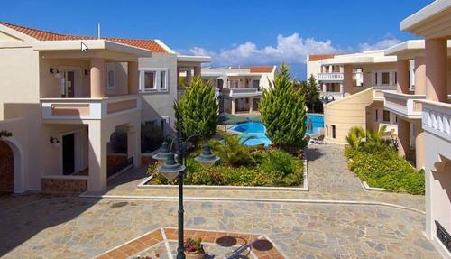 The swimming pool at or close to Sissy Village All Suite Hotel