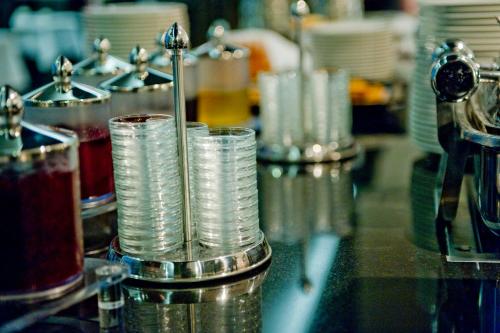 a group of glasses sitting on a counter top at Pannonia Tower in Parndorf