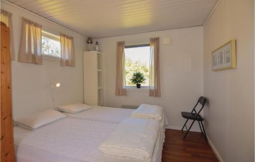 מיטה או מיטות בחדר ב-1 Bedroom Gorgeous Home In Hunnebostrand