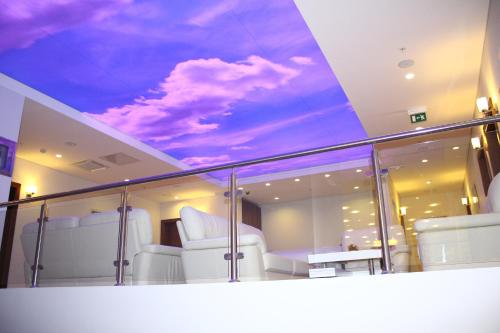 a ceiling in a room with a sky at Hotel Franca in Pljevlja