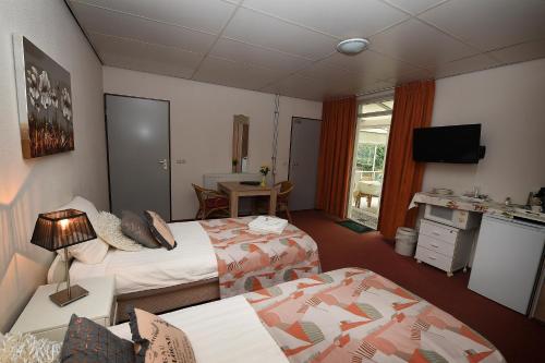 Postel nebo postele na pokoji v ubytování Motel Koolen