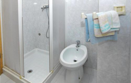 a bathroom with a shower and a toilet and a sink at Lovely Apartment In Izola With Kitchen in Izola