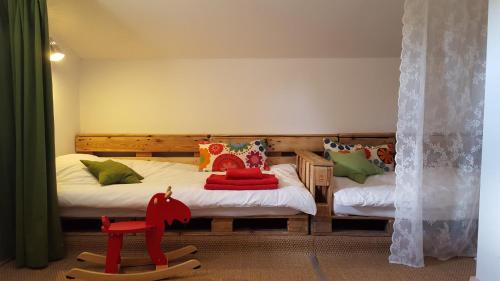 Ένα ή περισσότερα κρεβάτια σε δωμάτιο στο Casa Vella del Panta