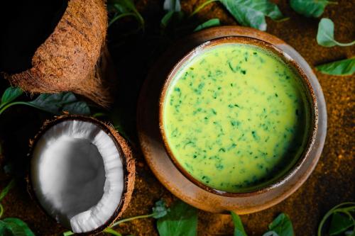 a close up of a bowl of avocado soup at Maison Perumal Pondicherry - A CGH Earth Experience in Puducherry