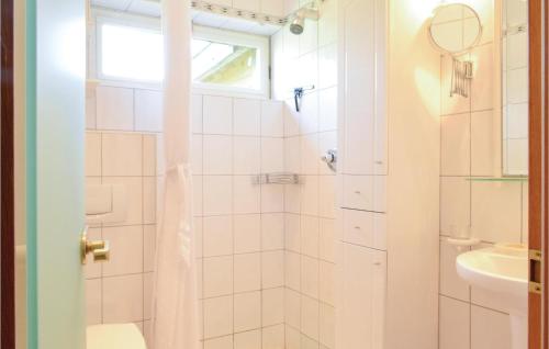 a bathroom with a shower and a sink at Le Rosier in Ovifat