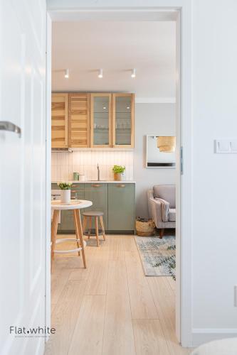 Ruang duduk di Apartamenty Flat White Obywatelska 47AB