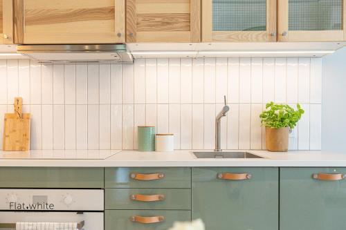 Dapur atau dapur kecil di Apartamenty Flat White Obywatelska 47AB
