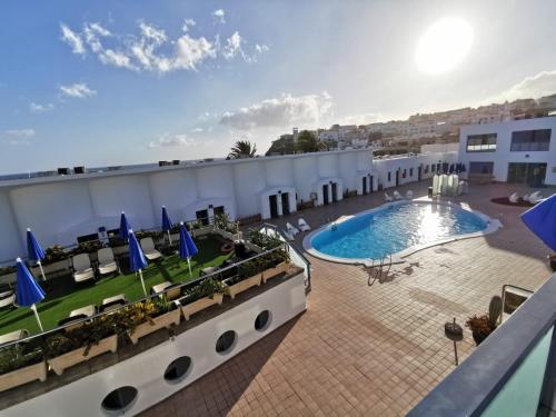 Kolam renang di atau dekat dengan Apartamentos Igramar MorroJable - Adults Only