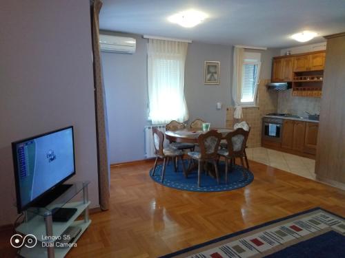 Kuchyň nebo kuchyňský kout v ubytování Apartmani Almica