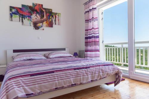 Postel nebo postele na pokoji v ubytování Holiday home Danica