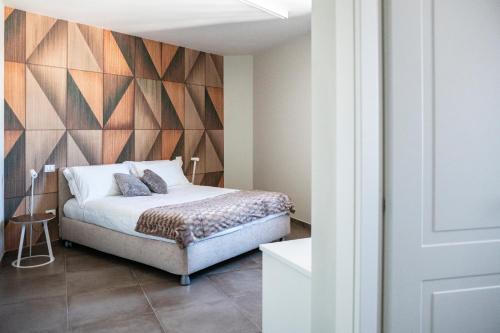 A bed or beds in a room at Residenza del Sele