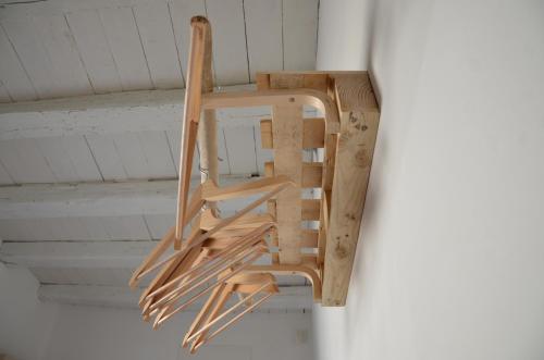 a wooden ladder hanging from a ceiling at 4 Camere A Trani in Trani