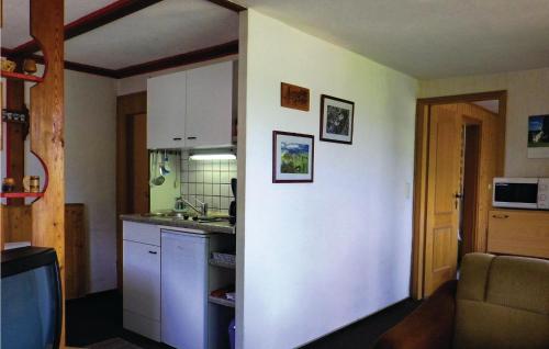 a kitchen with a sink and a counter top at Holiday home Am Hohen Rad W in Schwarzenberg
