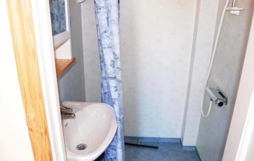 a small bathroom with a sink and a toilet at Stunning Home In Vrigstad With Wifi in Vrigstad