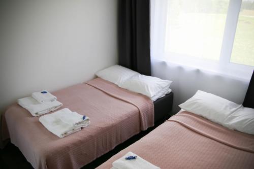Postel nebo postele na pokoji v ubytování Purjemaja