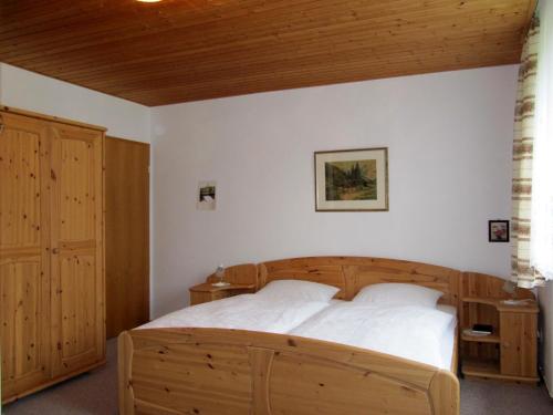 Tempat tidur dalam kamar di Landgasthof Zur Mühle