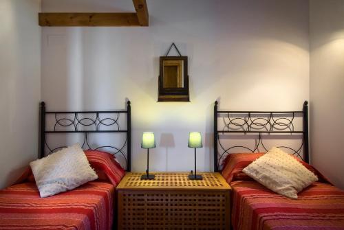 Ένα ή περισσότερα κρεβάτια σε δωμάτιο στο Casa Sarasa