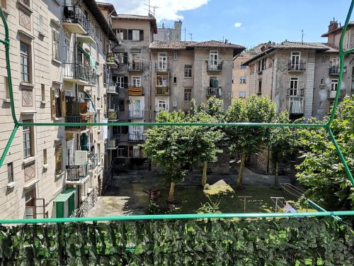 a view from a balcony of a city with buildings at Julia affittacamere in Trieste