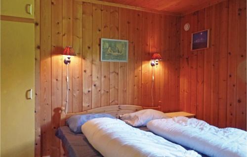 Säng eller sängar i ett rum på Thorleifsbu-skogheim