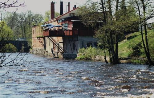 een rivier met een huis erop bij Lovely Studio In Mrrum With Wifi in Mörrum