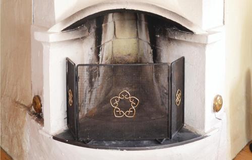 an old brick oven with the olympics on it at Gorgeous Home In Vrigstad With Wifi in Vrigstad
