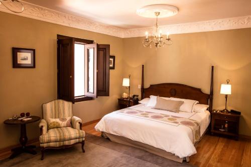Кровать или кровати в номере Villa Maria Cristina Hotel