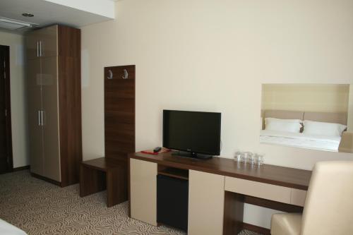 Телевизор и/или развлекательный центр в Hotel Franca