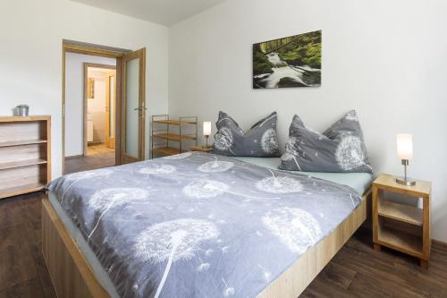 מיטה או מיטות בחדר ב-Apartmány Anička