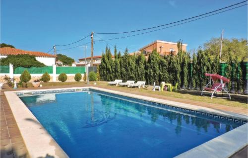 The swimming pool at or close to Stunning Home In Miami-Platja With Wifi