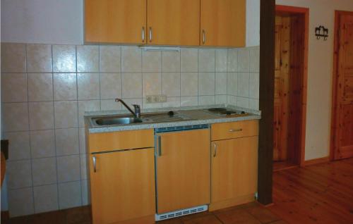 a kitchen with a sink and a counter top at 1 Bedroom Gorgeous Apartment In Thulendorf-sagerheide in Thulendorf