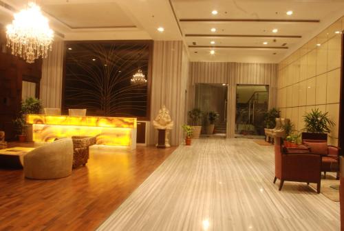 Lobbyn eller receptionsområdet på Hotel Pluto's