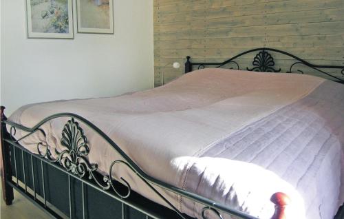 Uma cama ou camas num quarto em Amazing home in Vittaryd with 4 Bedrooms, Sauna and WiFi
