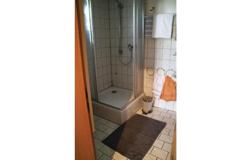 a bathroom with a shower and a tub and a toilet at Nice Home In Thierstein With Wifi in Thierstein