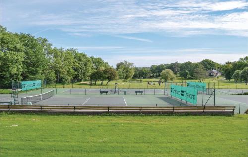 a couple of tennis courts in a park at Awesome Home In Sr With Wifi in Särö