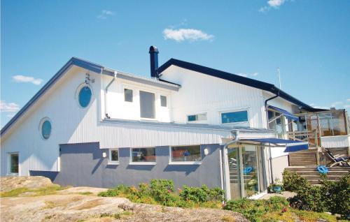 a white house on top of a hill at Villa Adenäs in Åsa